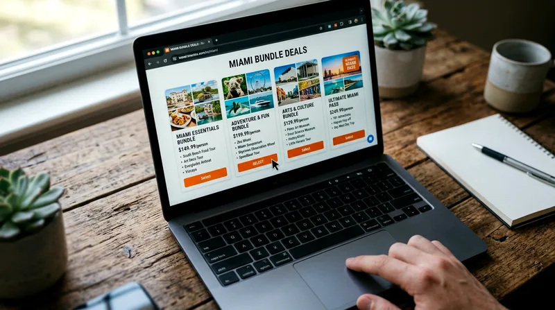 Laptop screen showing Miami attraction bundle packages and pricing.