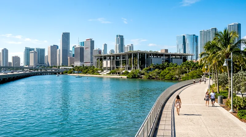 Museum building on Watson Island with Biscayne Bay and Miami skyline visible across water.