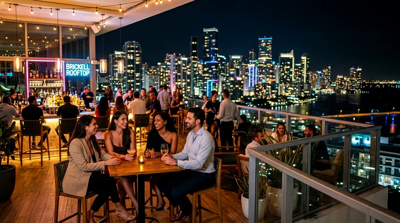 Rooftop lounge with patrons and Miami skyline glittering behind in Brickell at night.