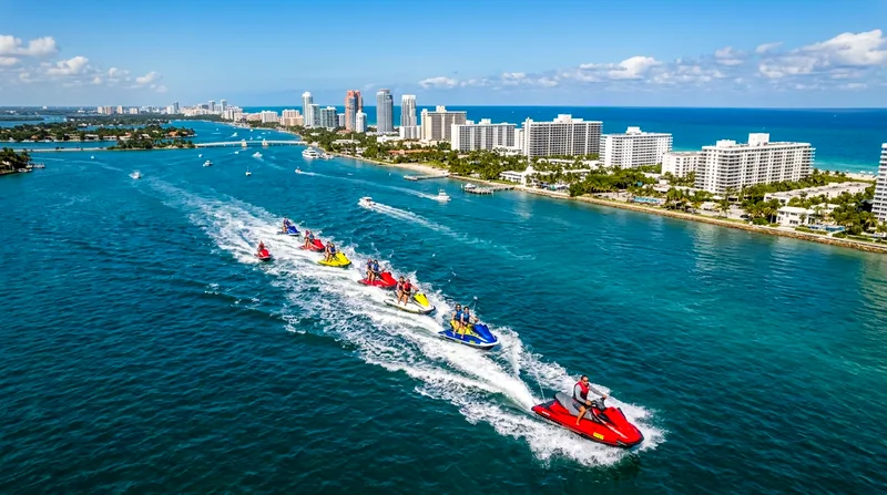 Aerial view of jet ski tour crossing Biscayne Bay near Miami Beach