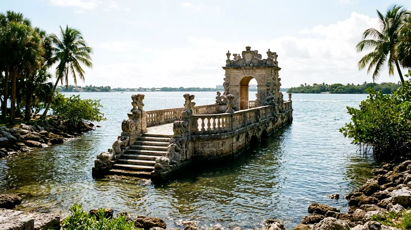 Ornate limestone barge sculpture extending into Biscayne Bay at Vizcaya.